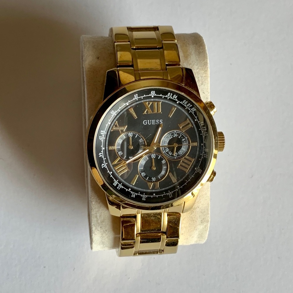 Guess Men’s yellow gold with black face